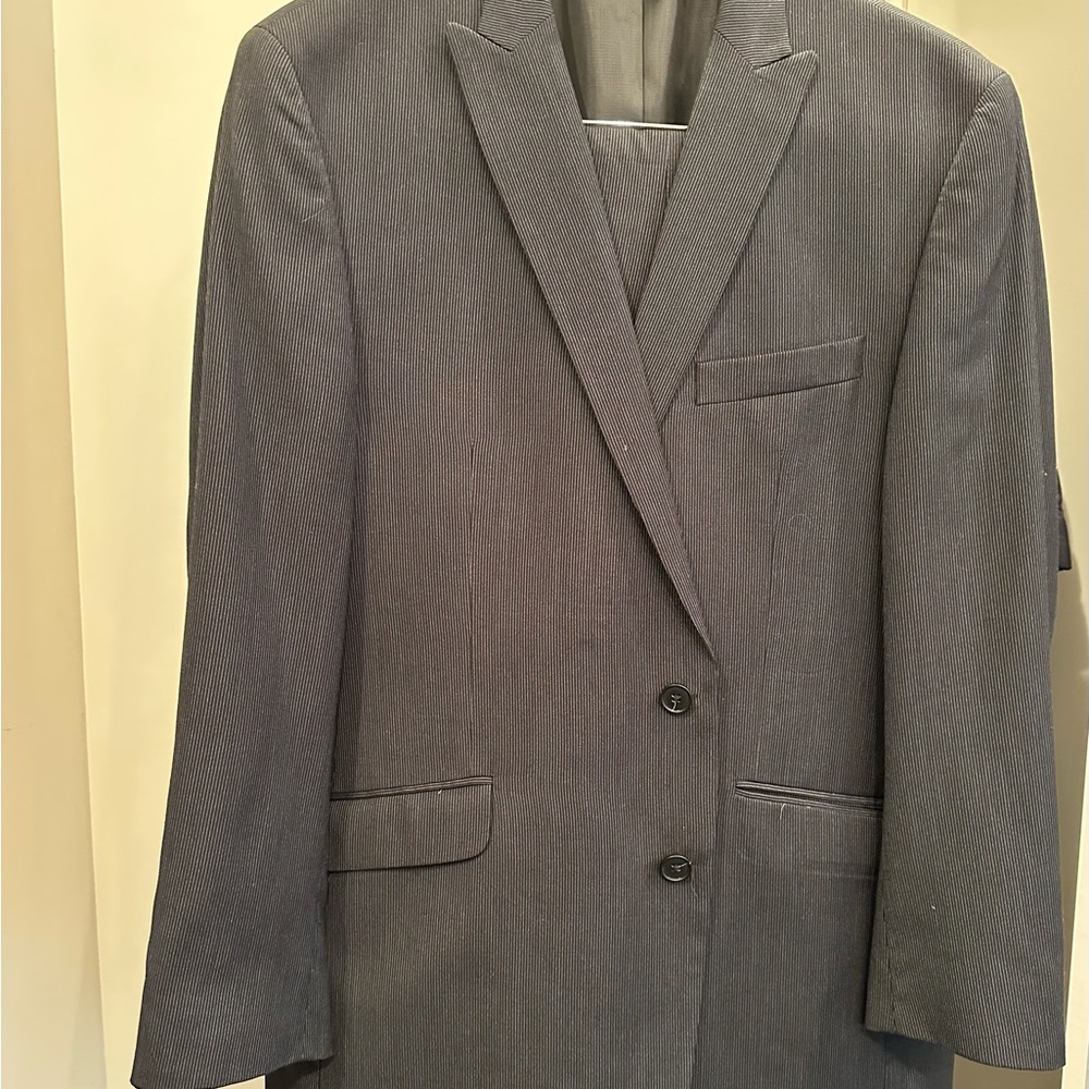Kenneth Cole Reaction dark grey suit with stripe, very faint.